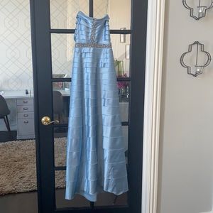 Baby blue satin strapless gown with silver beading.